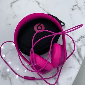 Beats by Dre Solo in hot pink headphone over ear